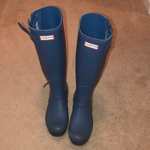 Blue hunter boots tall